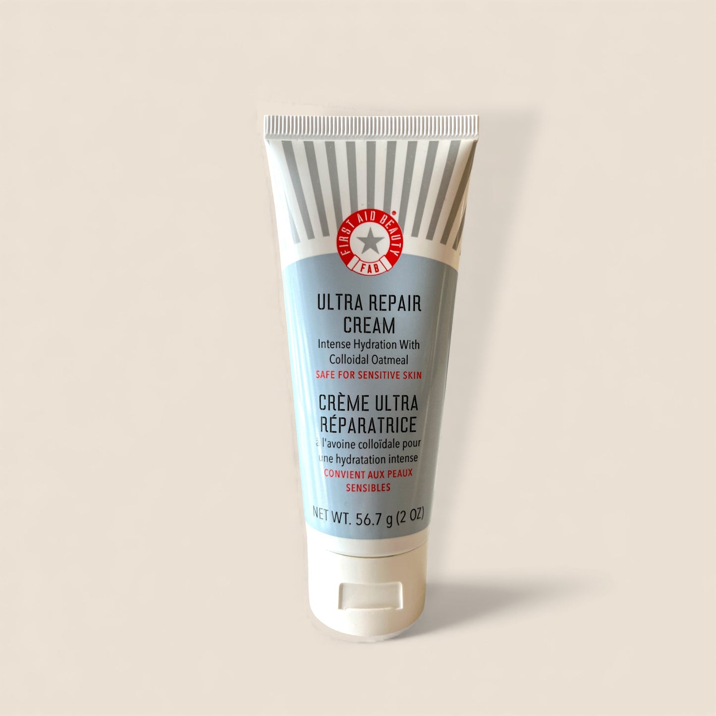Crème hydratante intense Ultra Repair, pour la réparation de la peau visage et corps – First Aid Beauty.