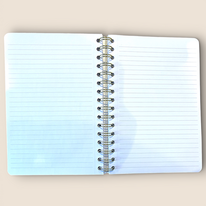 Carnet spiralé doré – Motif floral délicat