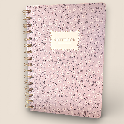 Carnet spiralé doré – Motif floral délicat